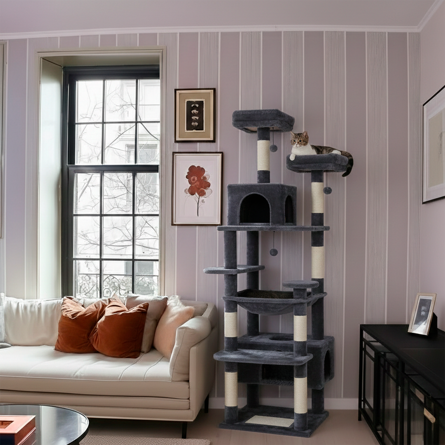 Cat tree in a living room with a couch and window