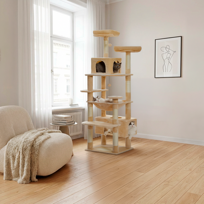 Cat tree with multiple levels in a room with a window and armchair.