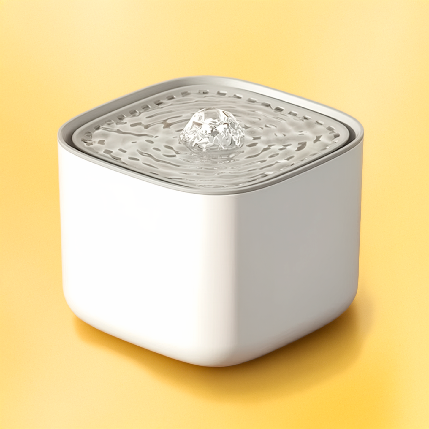 White pet water fountain with gray top on a yellow background