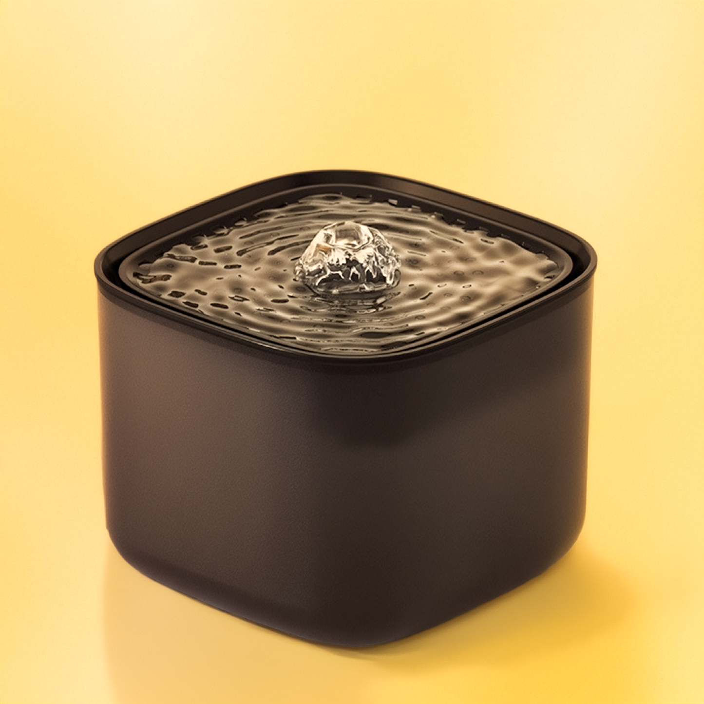 Black pet water fountain on a yellow background