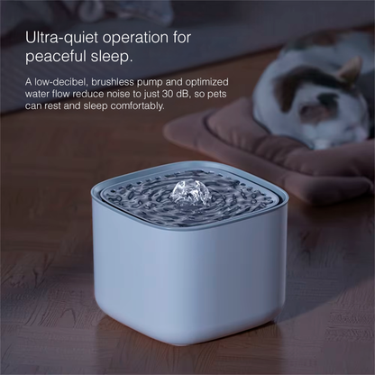 Pet water fountain with text about ultra-quiet operation on a blurred background